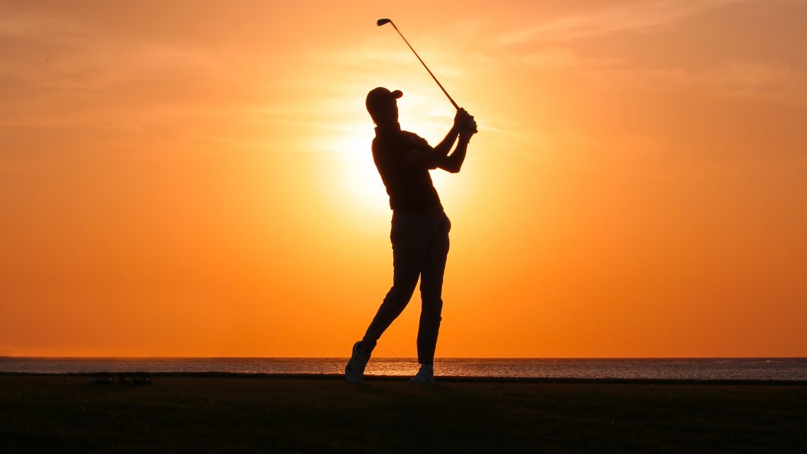 Golfer at Sunset at Royal Greens Golf & Country Club