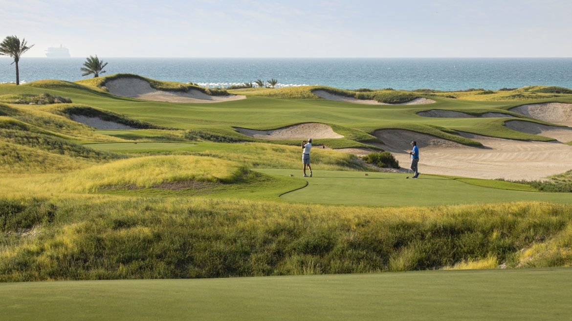 Two Golfers at Saadiyat Beach Golf Club in Abu Dhabi