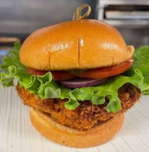 Bump's Signature Pork Tenderloin Sandwich, a specialty at Finkbine Golf Club