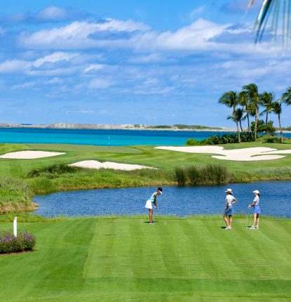 Women teeing off at the Ocean Club Golf Course