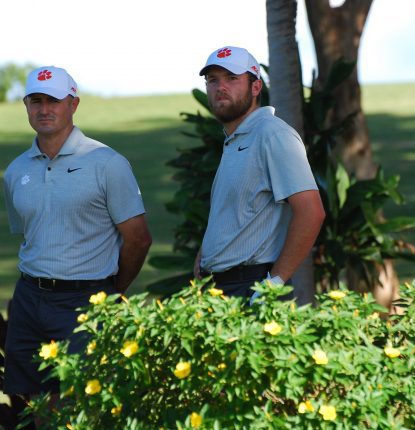 Clemson head coach Jordan Byrd and tournament co-leader Andrew Swanson on No. 15 tee