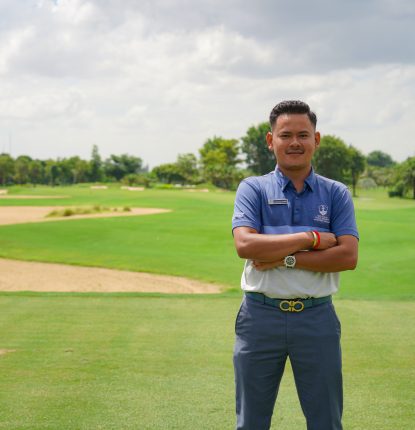 Pheara Chhoeun standing on a tee box at Vattanac Golf Resort