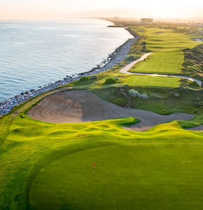 Aerial view of the golf course at Al Mouj Golf in Oman