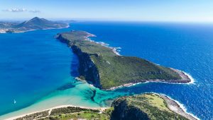 Aerial view of the natural beauty and beach areas in and around the Costa Navarino resort