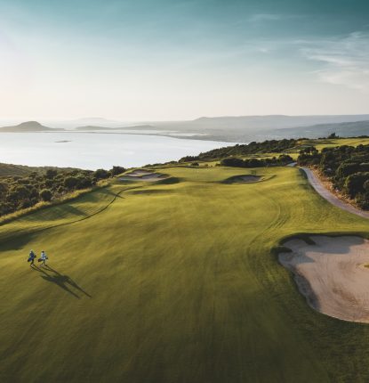 A golfer on the green at The International Olympic Academy Course at Costa Navarino in Greece